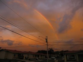 Rainbow over some homes in David, Panama – Best Places In The World To Retire – International Living